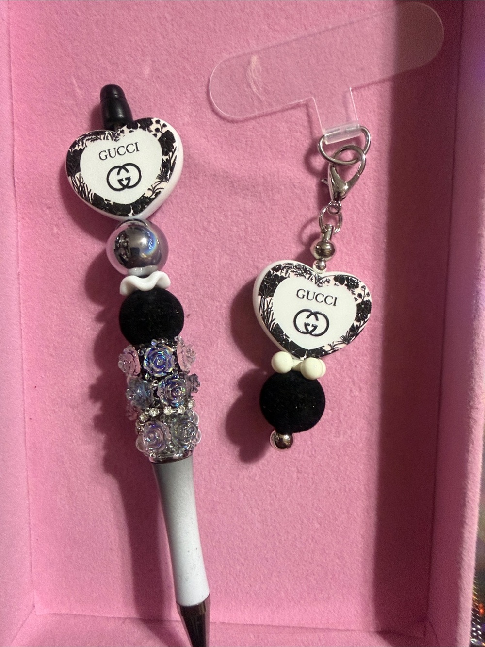 Black & white l rhinestone pen with matching phone charm.
